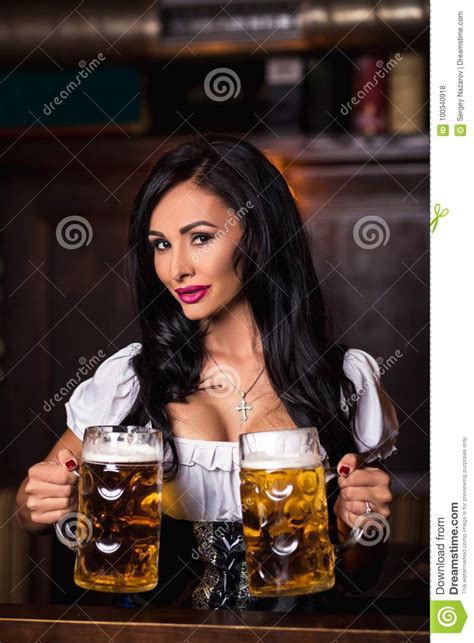 Woman In Dirndl Dress Holding Oktoberfest Beer Stein