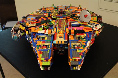 rainbow colored lego millennium falcon built  scratch autoevolution