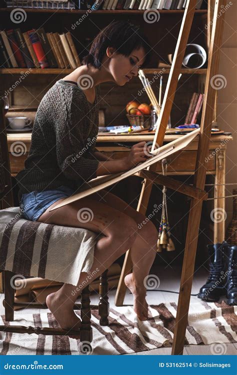 female artist painter stock photo image  holding paint