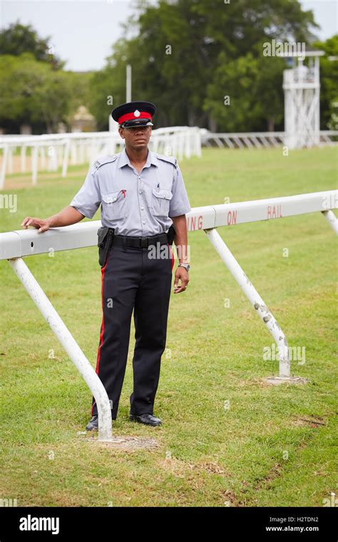 barbados bridgetown policeman uniform racecourse course black male man