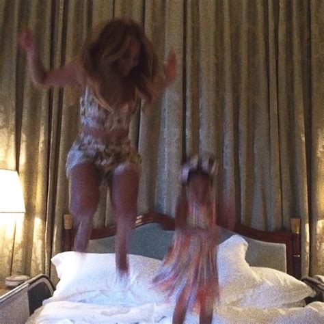 beyonce bounces on a bed with daughter blue ivy blue ivy