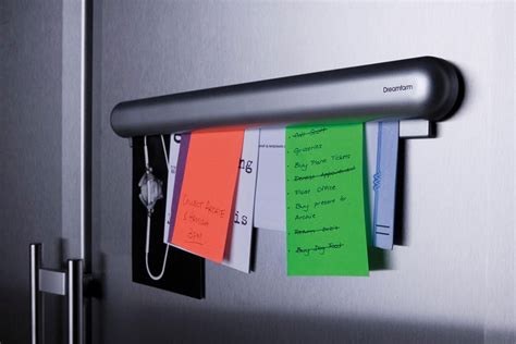 gripet   wall mounted organizer  holds notes  place