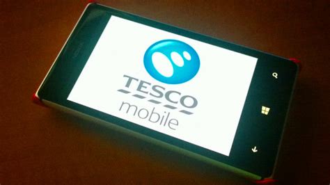 tesco mobile ditches  surcharge     neowin