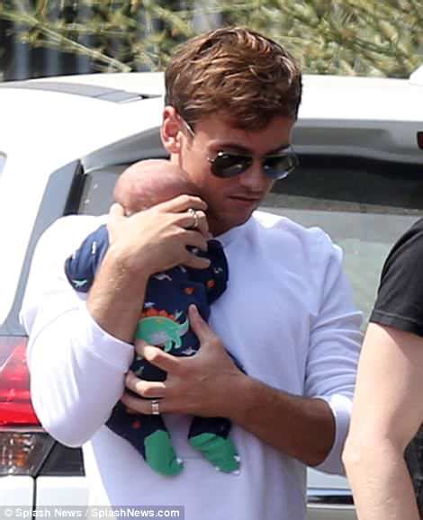 tom daley and dustin lance black pictured with newborn son daily mail