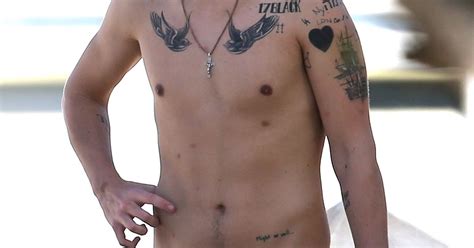 harry styles and those tattoos didn t he think before he inked