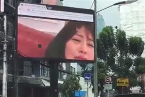 bored man hacks  giant billboard     porn  stuck