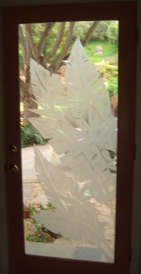 banana leaves with bird of paradise etched glass door panel bamboo