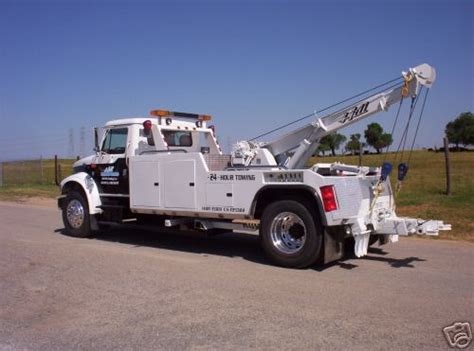 towing insurance rates  tow trucks  flatbeds