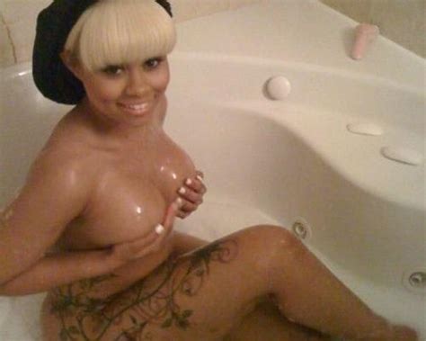 blac chyna nude in the bathtub showing huge boobs but covering and hiding nipples