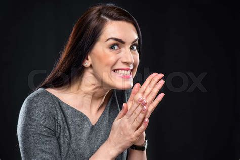 Scheming Woman Rubbing Her Hands Stock Image Colourbox