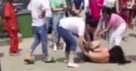 jilted wife strips and beats husband s mistress in full
