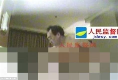 communist party official sacked after pictures of him