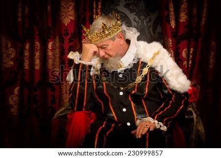 pensive  worried king sitting   throne stock photo  shutterstock