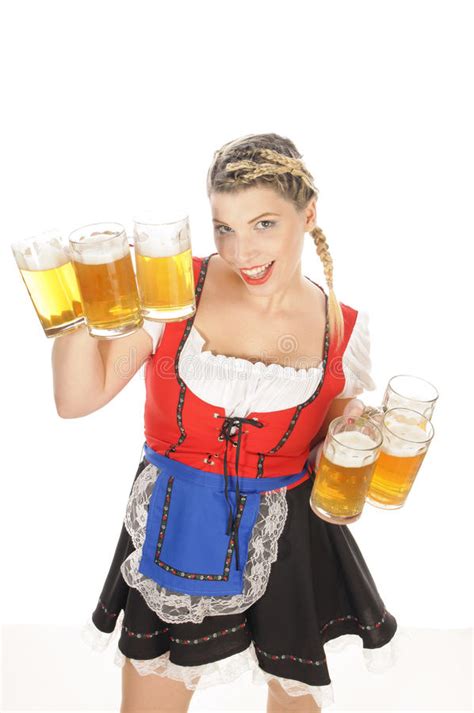 Girl In Oktoberfest Dirndl Holds Oktoberfest Beer Stein