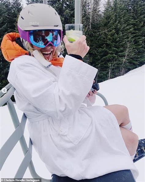 chelsea handler skis pantsless with a drink and joint in hand for her