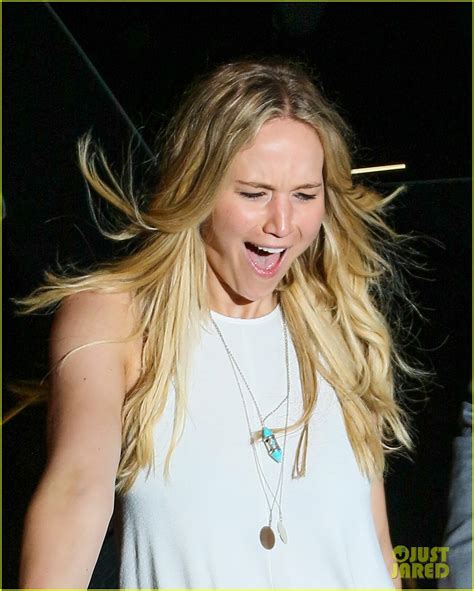 Jennifer Lawrence Leaves Dinner With Chopsticks In Her Mouth Photo