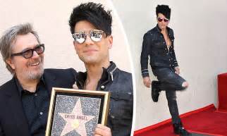 criss angel and gary oldman at hollywood walk of fame daily mail online