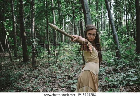 female warrior pointing  spear camera stock photo  shutterstock
