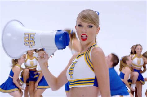 Taylor Swift Dresses As A Cheerleader For New Video Shake It Off