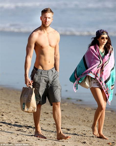 calvin harris goes shirtless on beach with aarika wolf daily mail online