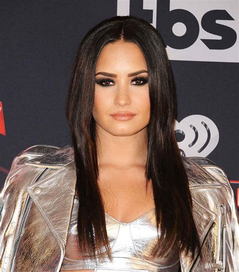 demi lovato remains in the hospital five days after overdose