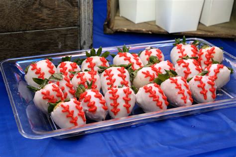 plastic tray filled  white chocolate covered strawberries  topped  red sprinkles
