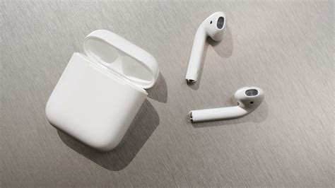 apple airpods review apples airpods  improved  time cnet