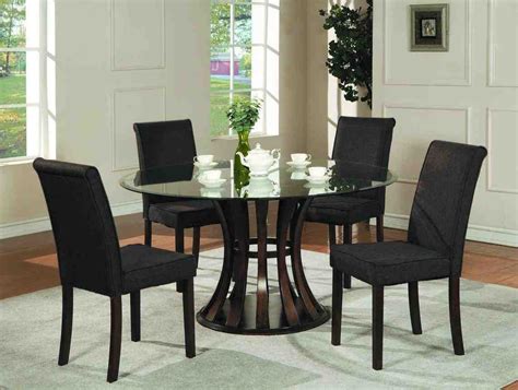 black chairs  dining table home furniture design