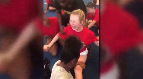 Video Shows High School Cheerleaders Held Down Forced Into Splits Wgn Tv