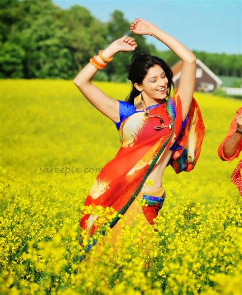 actress hot images tanwi vyas shoing navel in red saree