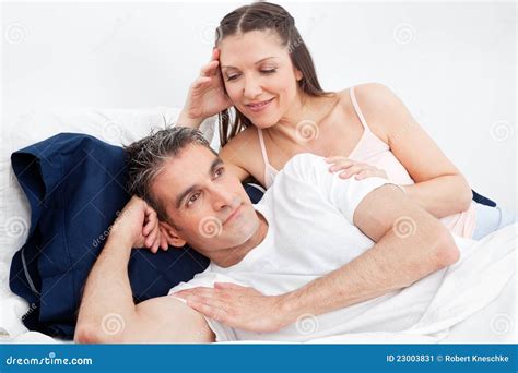 man  bed turning   woman stock image image  frustrated