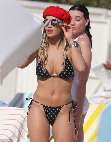rita ora displays her gorgeous curves with daisy lowe on