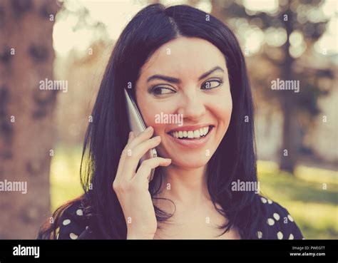 Beautiful Ethnic Woman Having Phone Call While Smiling And Standing