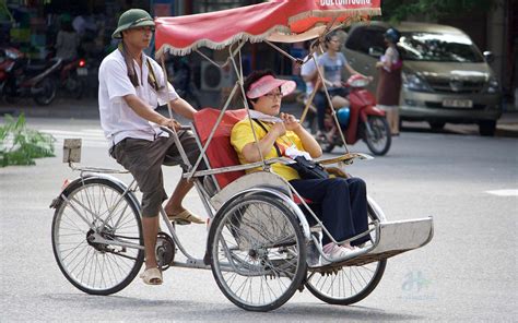 cyclo  hanoi vietnam  especial vehicle accompany time