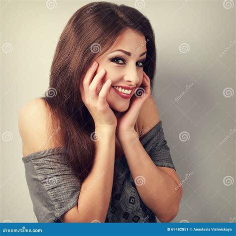 Happy Laughing Brunette Young Woman Holding The Hand At Face And Stock