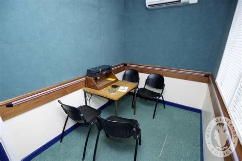 day  west midlands police custody interview room interview rooms wooden skirting board
