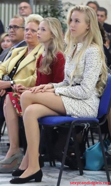 sexycandidgirlstop  extremely cute blonde teen   short dress sitting   slim legs