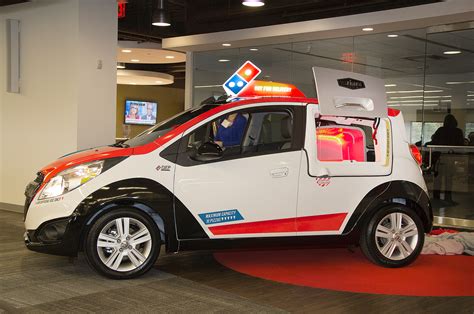 dominos    car business  dxp pizza delivery vehicle