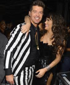 robin thicke s mother gloria loring criticises miley cyrus but his wife paula patton is cool