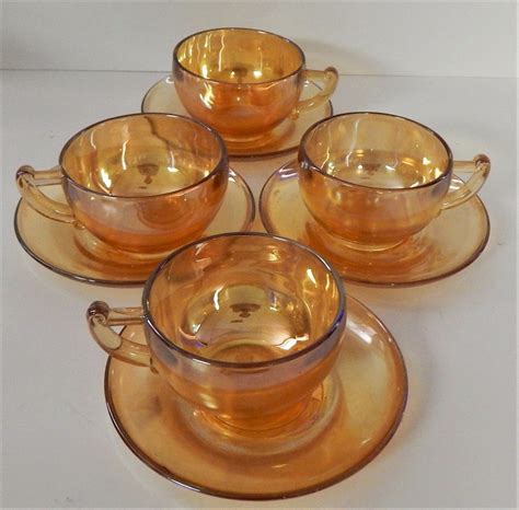 4 Jeanette Glass Co Tea Cups And Saucers Marigold Iridescent Carnival