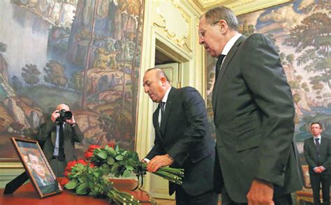 russian foreign minister sergei lavrov right and his turkish counterpart mevlut cavusoglu lay
