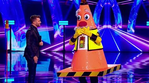 masked singer shock as bookies ‘reveal the celebs and say traffic cone
