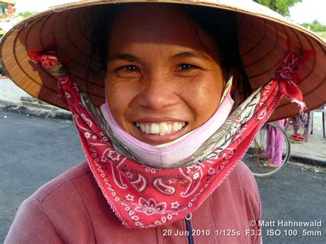 facing the world facing the asian conical hat