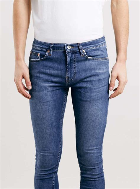 topman denim mid wash super spray on skinny jeans in blue