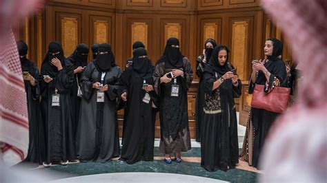 cellphones in hand saudi women challenge notions of male control the