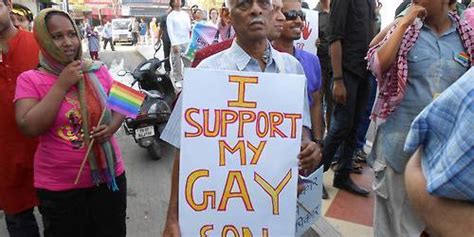 the sign that this dad brought to a gay pride march will