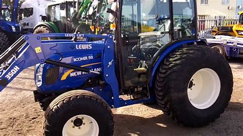 holland boomer  cw lewis qh loader youtube