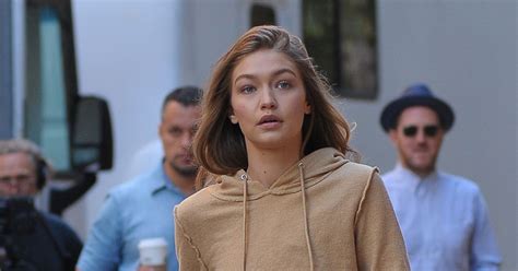 Gigi Hadid Flashes Her Washboard Abs In Crop Top And Slips Into Skin