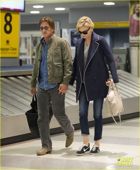 charlize theron and sean penn hold hands upon new york
