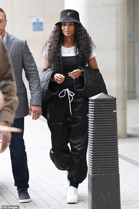 ciara borrows from the nineties in edgy bucket hat with